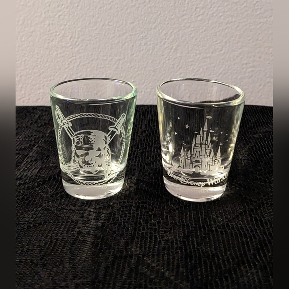 Walt Disney World Castle and The Pirates of the Caribbean Skull Logo Shot Glass - Picture 1 of 1